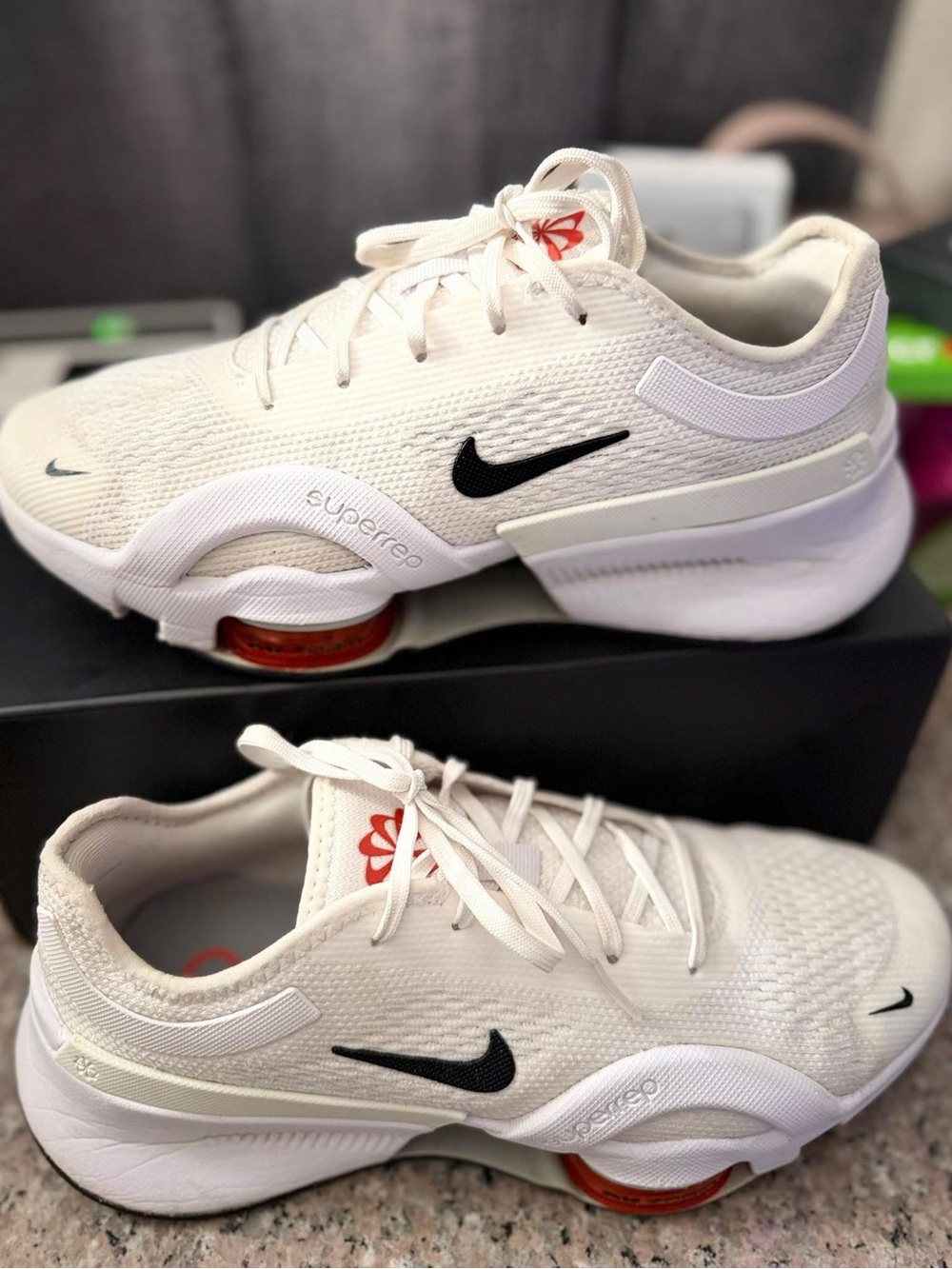 Nike Women's White and Black Athletic Shoes with Red Accent